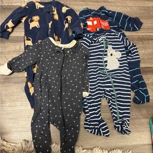 FOUR Baby Boys Sleepers- size 0-3 months